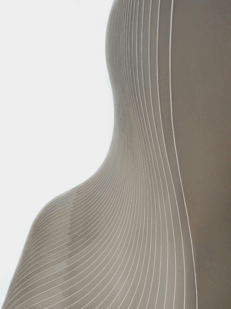 Modern abstract design with smooth curved architectural lines creating a visually striking pattern.